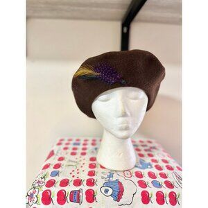Vintage wool brown beret with purple feather detail